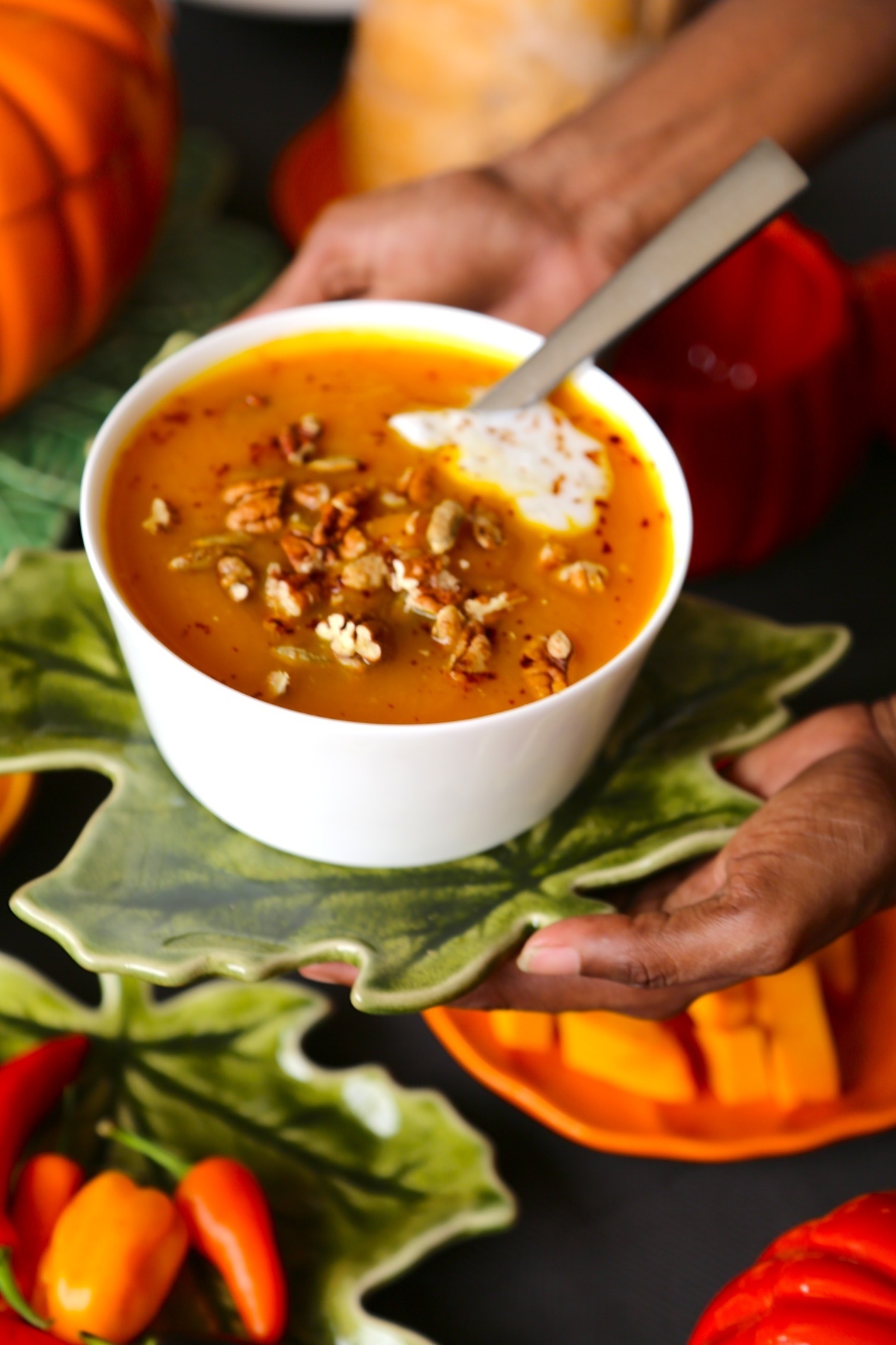 SPICY PUMPKIN SOUP WITH TOASTED PECANS AND PUMPKIN SEEDS