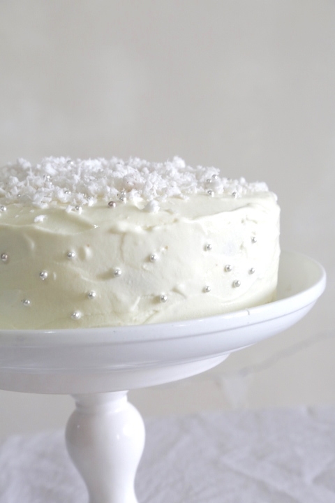 SNOW FROSTED COCONUT AND POPPY SEED CAKE
