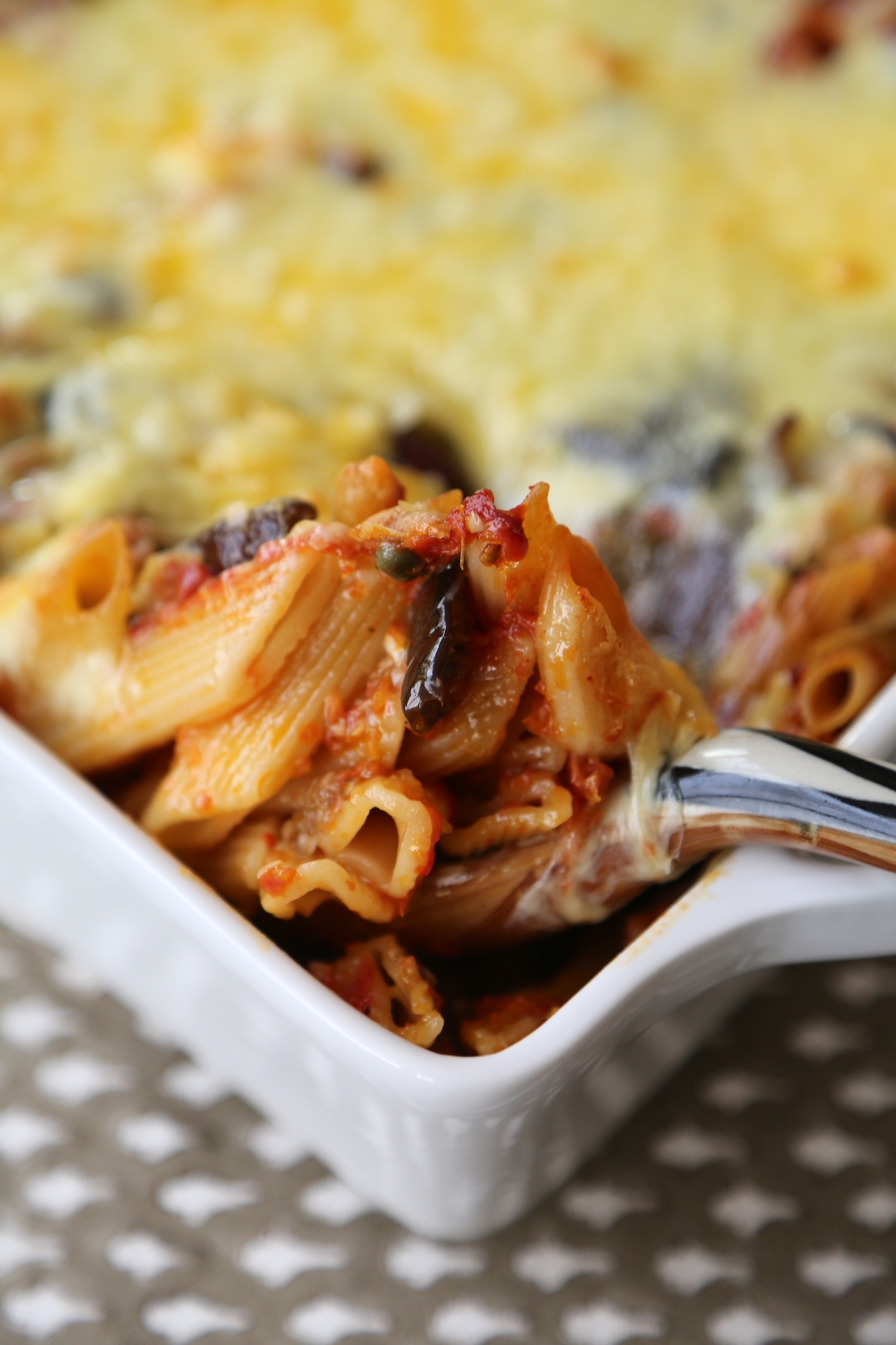 Baked Penne with eggplant, capers and tomatoes